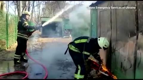 Emergency services film Kyiv firefighters after rocket strikes