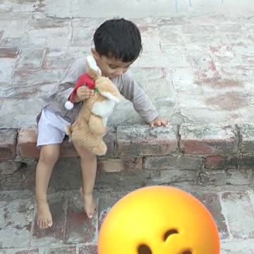 Baby girl love his toy