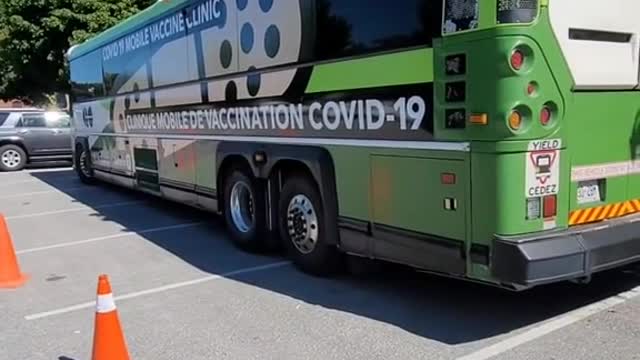 MOBILE 'CLOT SHOT' CLINIC IN BARRIE ONT. CANADA - LOOK AT THAT LONG LINE UP! - THEY GETTING REAL DESPERATE!