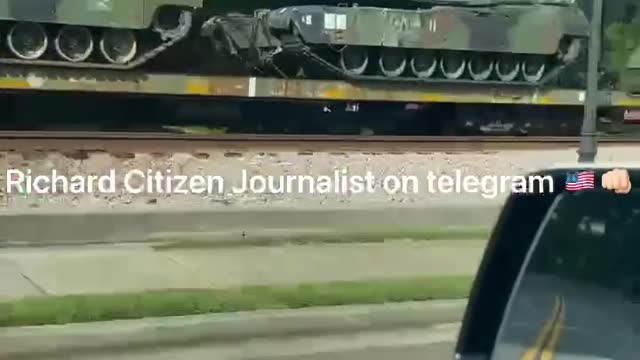 A parked train full of military Equipment in Georgia