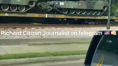 A parked train full of military Equipment in Georgia