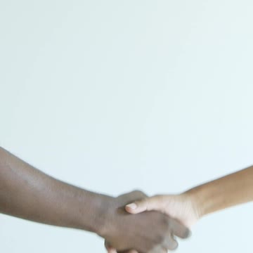 Two People Shaking Hands