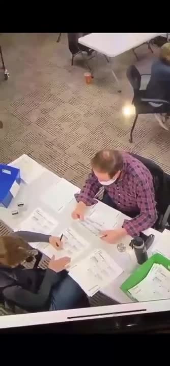 Ballot counter caught red handed FILLING OUT BALLOTS
