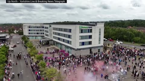 Asylum seekers film rioters making threatening gestures as they surround Rotherh