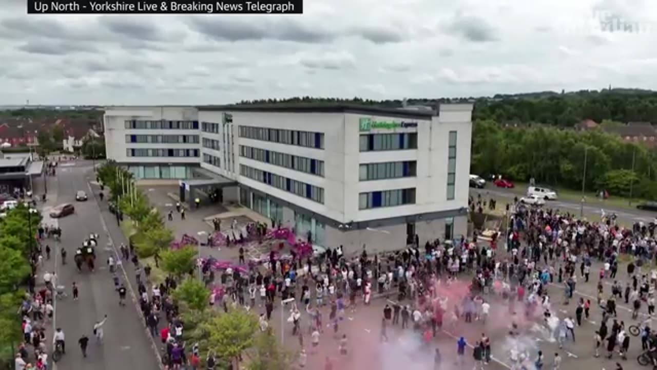 Asylum seekers film rioters making threatening gestures as they surround Rotherh