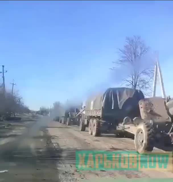 Artillery column of the Russian army in the village Volchansk (Kharkov region)