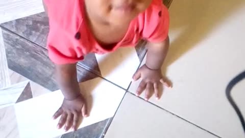 Baby enjoying crawling.