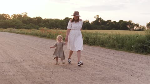 Cute baby runing with mom