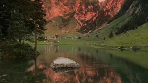 Red colored mountains at Seealpsee