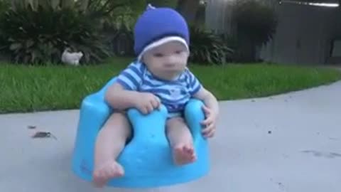 A bunny steals this adorable baby's chip from his hand