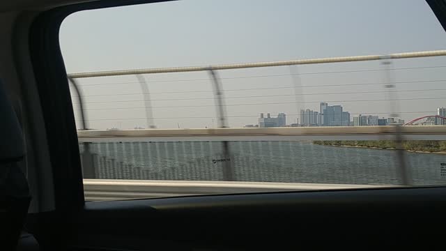 The view from a car driving on the Korean highway