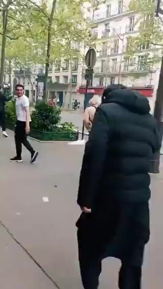 Afghan migrants take over the streets of Paris in a terrifying show of force against ...