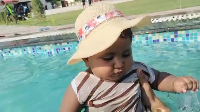 Baby enjoying swimming