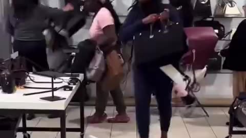 A group of women shoplifting at the Outlets at Orange in Orange, California,