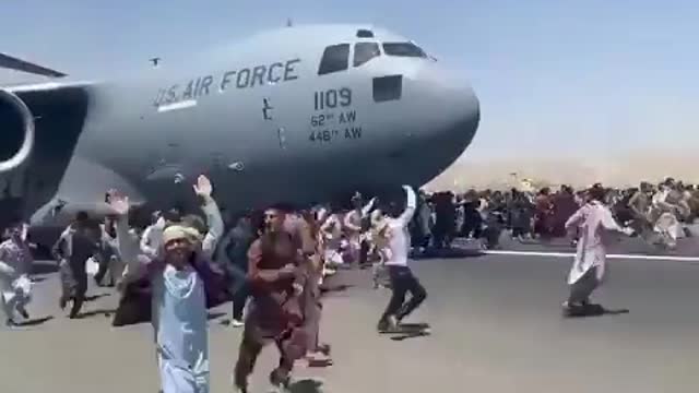 Afghans Load Up Runway in Last-Ditch Effort for Survival