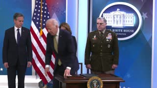 Biden signs a bill to deliver more aid to Ukraine, and says "I'm not going to comment on anything..."