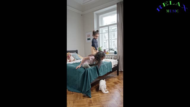 KIDS PLAYING WITH CAT