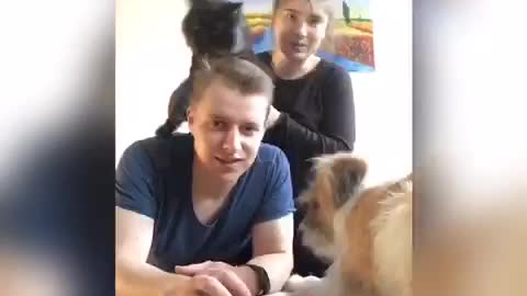 Guy fails at taking a picture of himself and pets