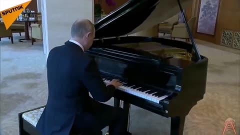 Russia's Putin plays "O Canada" while waiting to meet with China's Xi Jinping