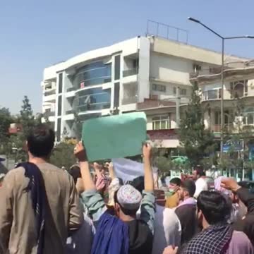 Taliban members attack protesters in Kabul, Afghanistan