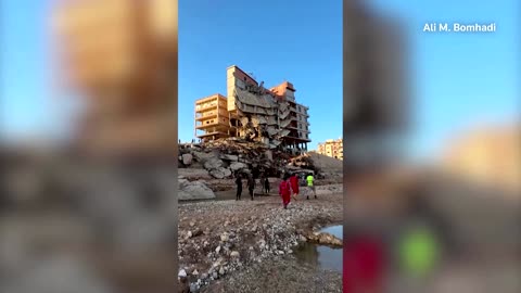 Libyans inspect what's left of their flood-hit city