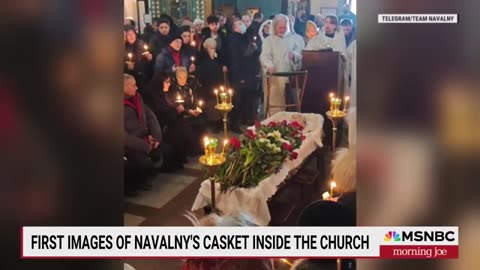 First images of Navalny_s casket inside the church