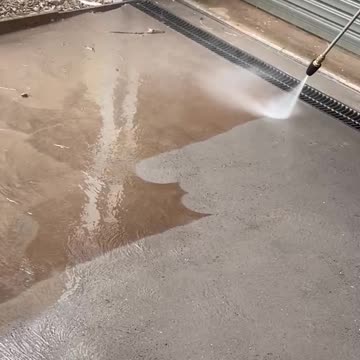 Cleaning a sandy driveway