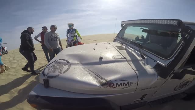 Dirt Bike Dune Jump Lands on Jeep Wrangler