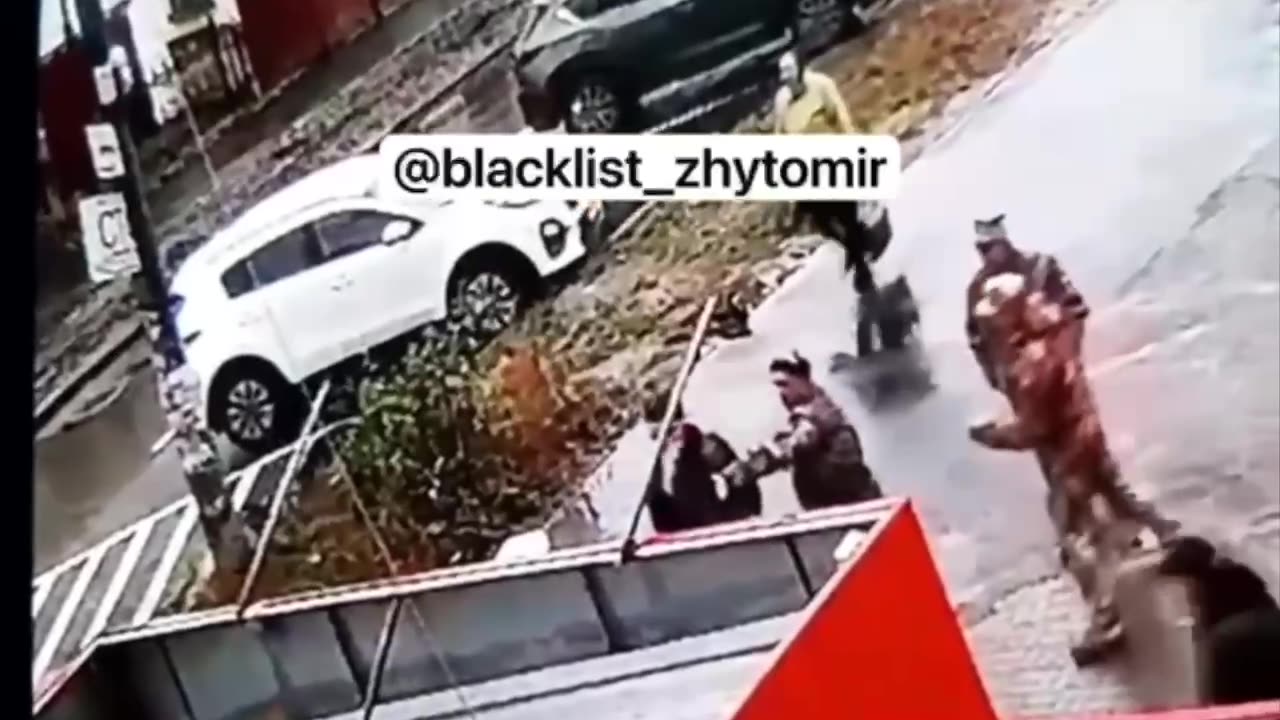 Conscript resists enlistment officers in Zhitmor, Ukraine