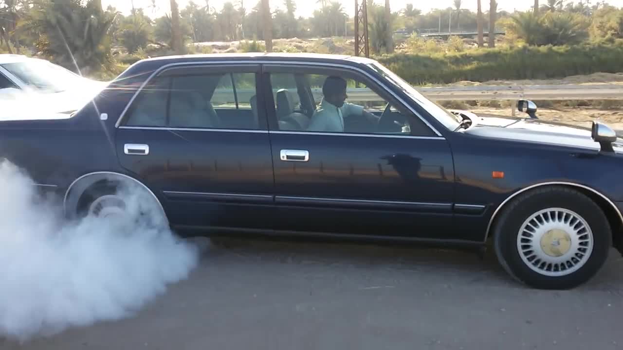 car drifiting on road amazzing work by boys showing high level of telent