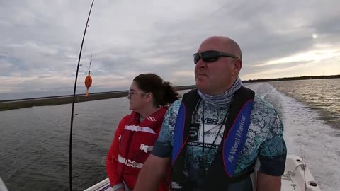 Out-fished by Redhead Lady in Red