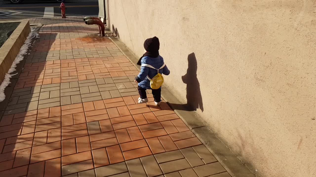 Baby's first way to school.