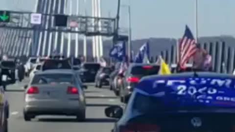 We do not give in! Car parade over a NY Bridge