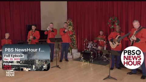 U.S. military members perform oh come all ye faithful