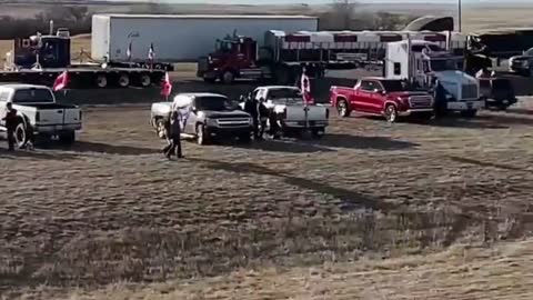 Massive convoy of truckers have blockaded the US-Canada border crossing in Alberta.