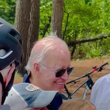 He Can’t Help Himself: Joe Biden Takes a Break From His Bike Ride to Sniff Little Girl’s Hair