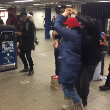 Old couple dancing to spanish music band