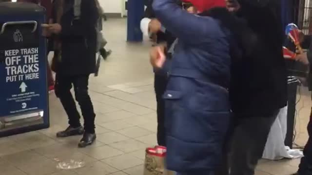 Old couple dancing to spanish music band