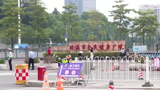 Flowers and tributes removed from mass killing site in China