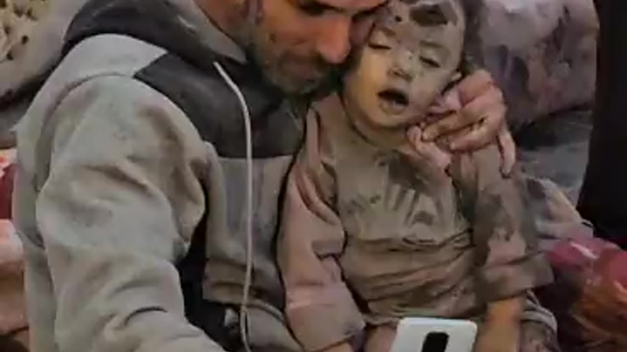 A bereaved Palestinian father captures a final moment with his young daughter