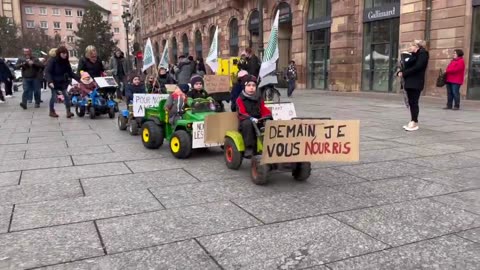 🪧 RESISTANCE NEWS – Children of farmers protest in mini tractors in the streets of Strasbourg