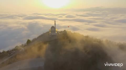 Tranquil Harmony: Mesmerizing Landscape Between Mountains and Mosque