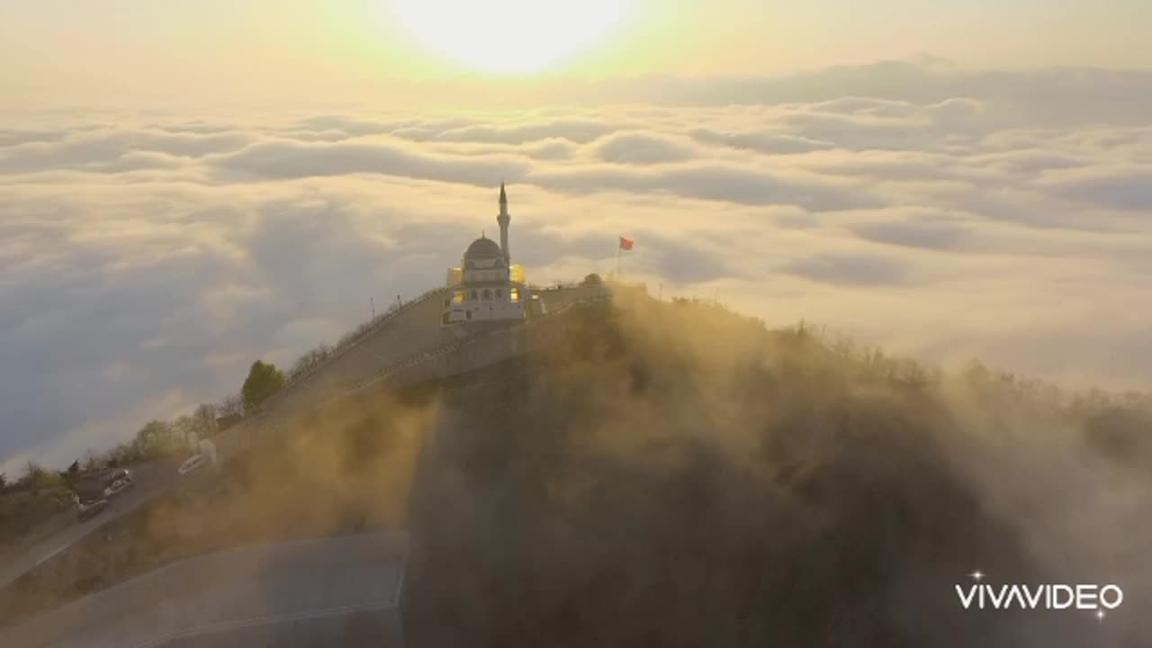 Tranquil Harmony: Mesmerizing Landscape Between Mountains and Mosque