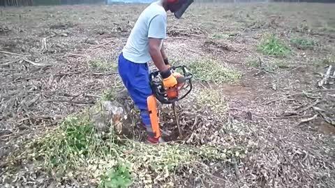 Soil preparation (pitting) using earth auger in plantation forests