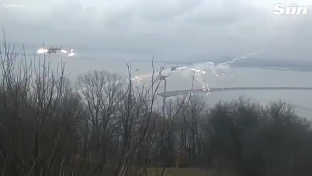 Swarm of Russian helicopter gunships blitzing Ukraine airport as Putin launches invasion