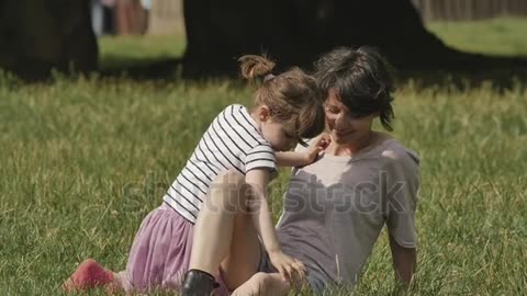beby girl kissing her mother, slowmo footage.