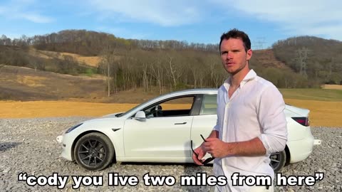 Driving A Tesla Upside-Down (10ft Tall Wheels).