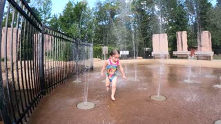 Delilah Plays In Splash Pool