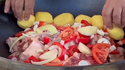 Khashlama from Oxtails Domestic ducks on a spit Dish in a cauldron