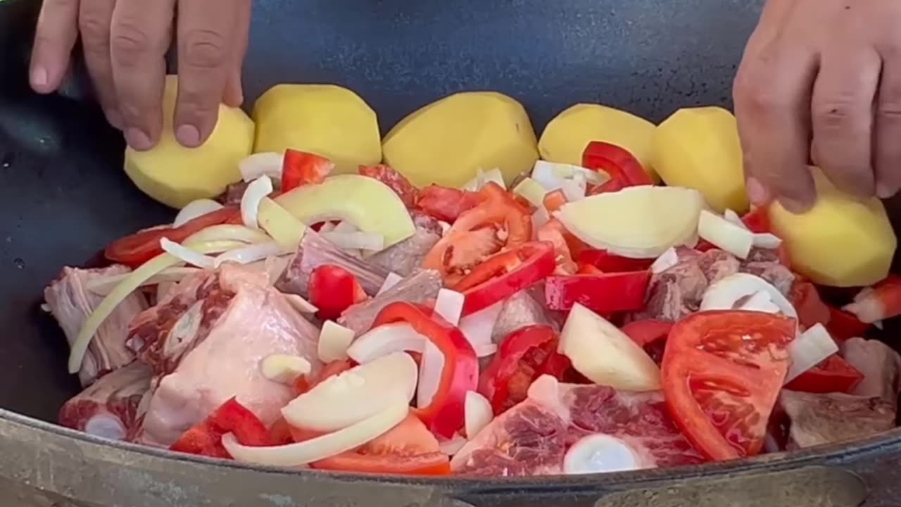 Khashlama from Oxtails Domestic ducks on a spit Dish in a cauldron